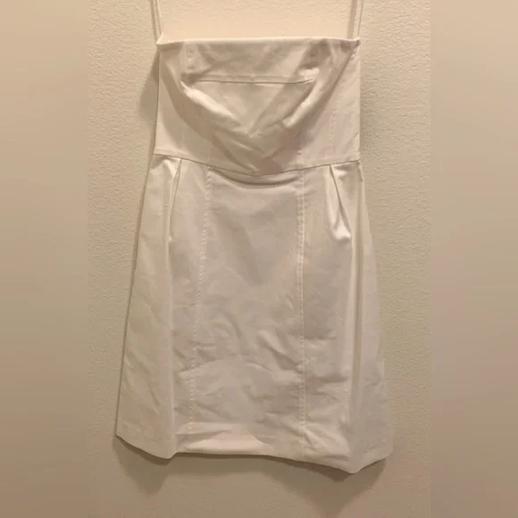 theory white silk dress The Dress Theory added a new photo in